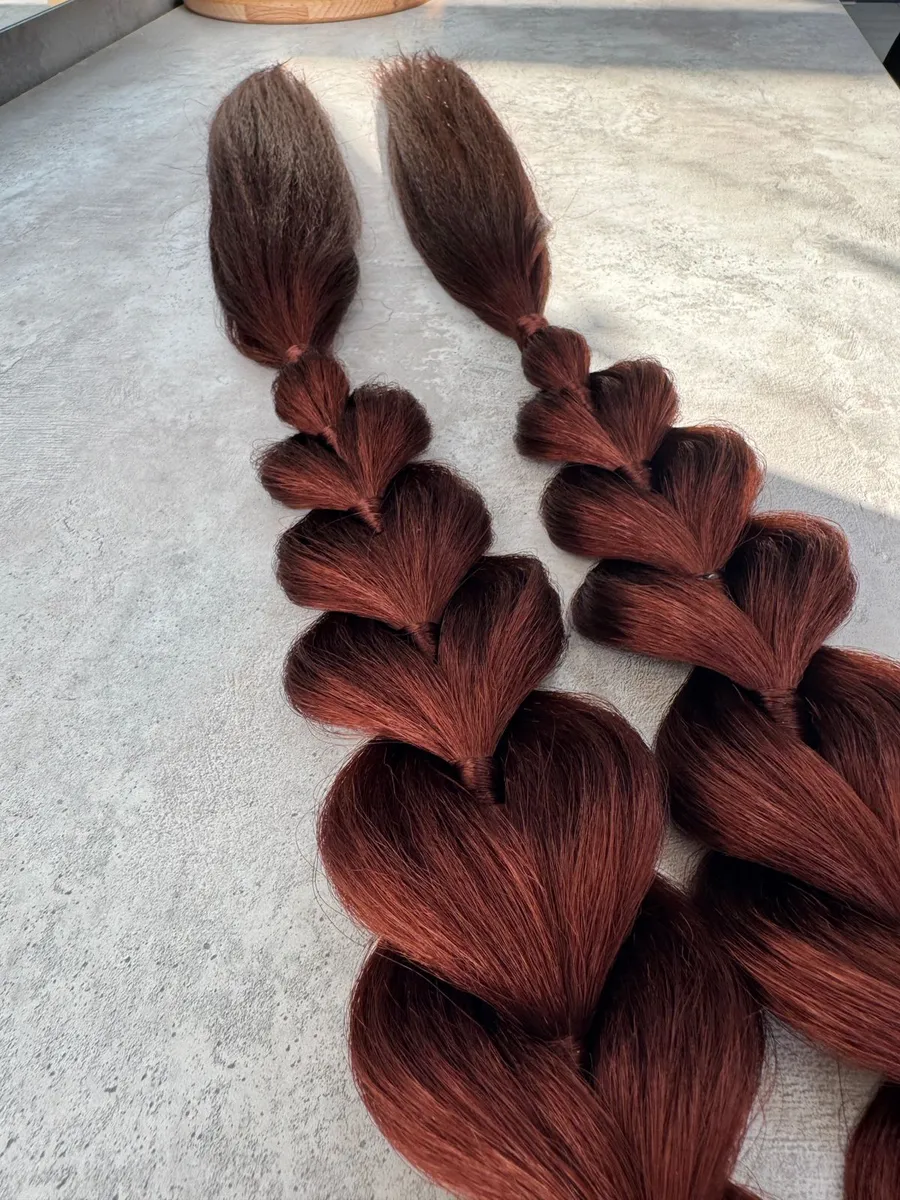 Французские косы с хвостами на заколках