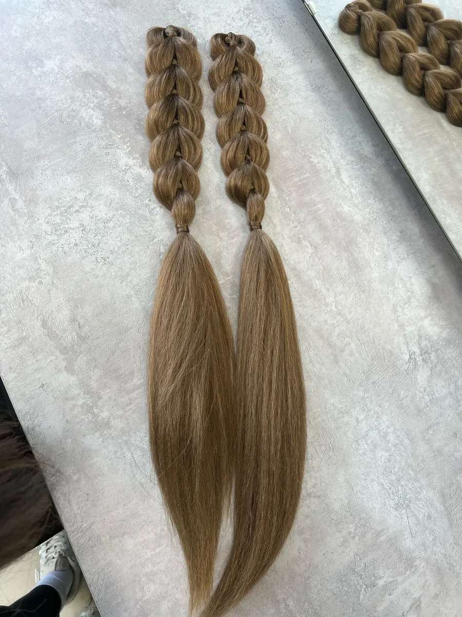 Французские косы с хвостами на заколках