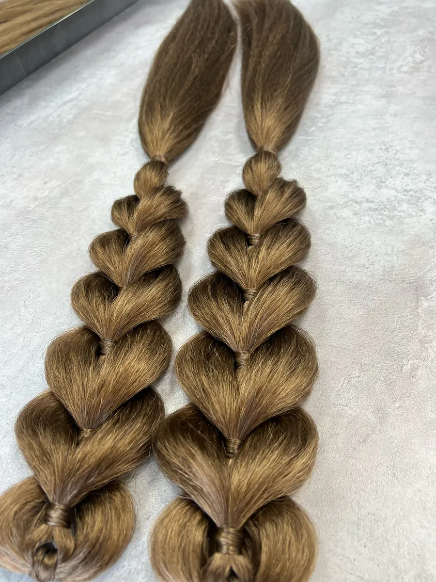 Французские косы с хвостами на заколках