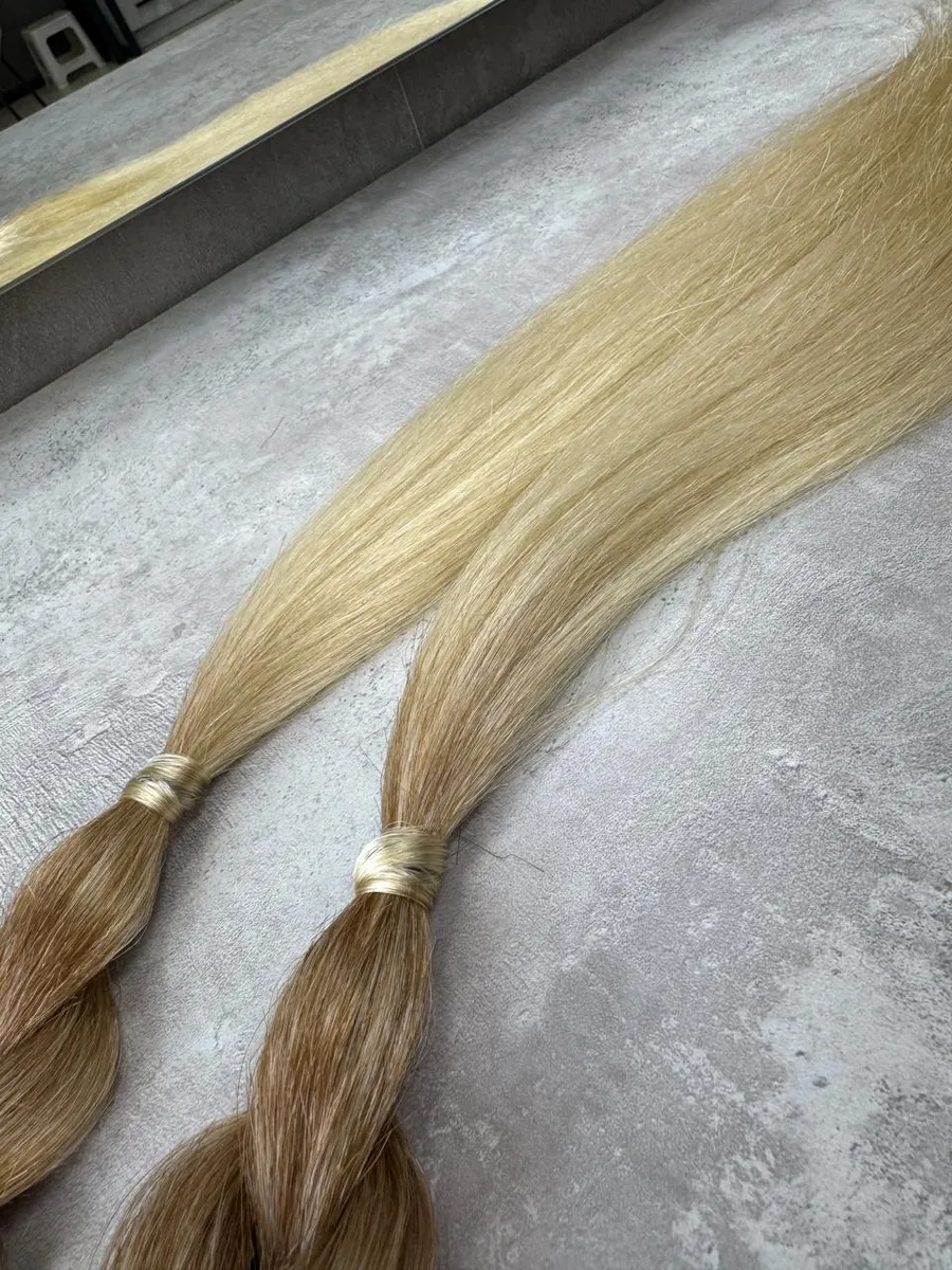 Французские косы с хвостами на заколках