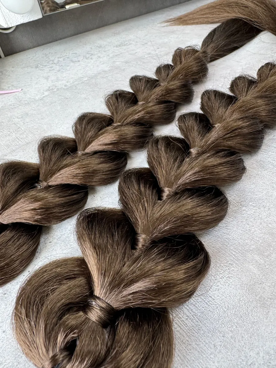 Французские косы с хвостами на заколках