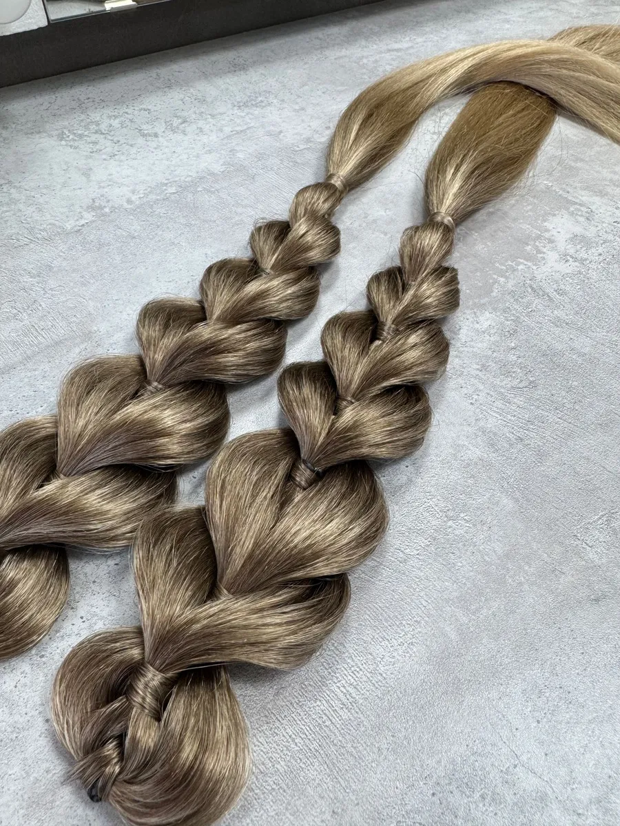 Французские косы с хвостами на заколках