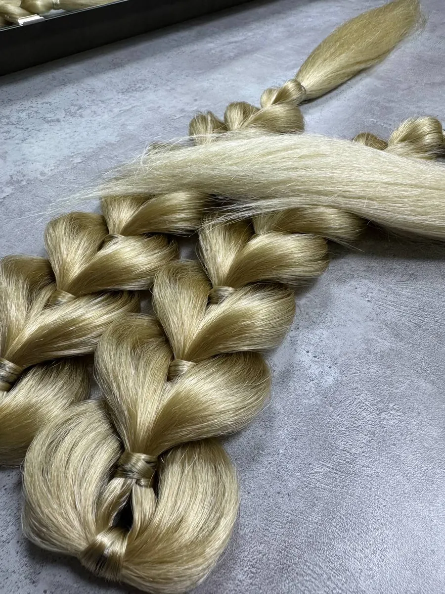 Французские косы с хвостами на заколках