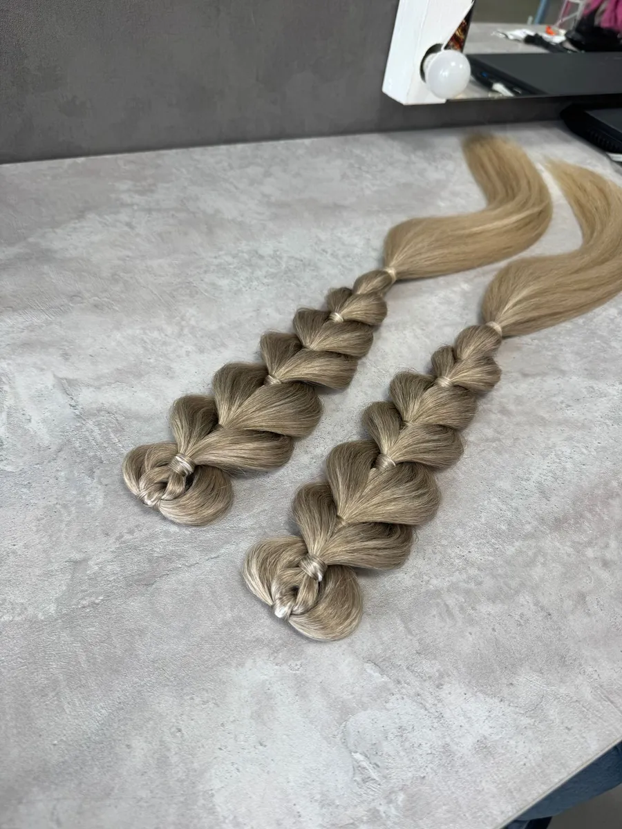 Французские косы с хвостами на заколках