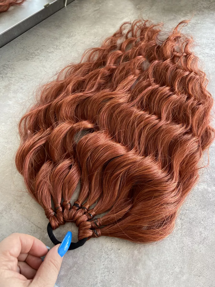 Хвост на резинке волна